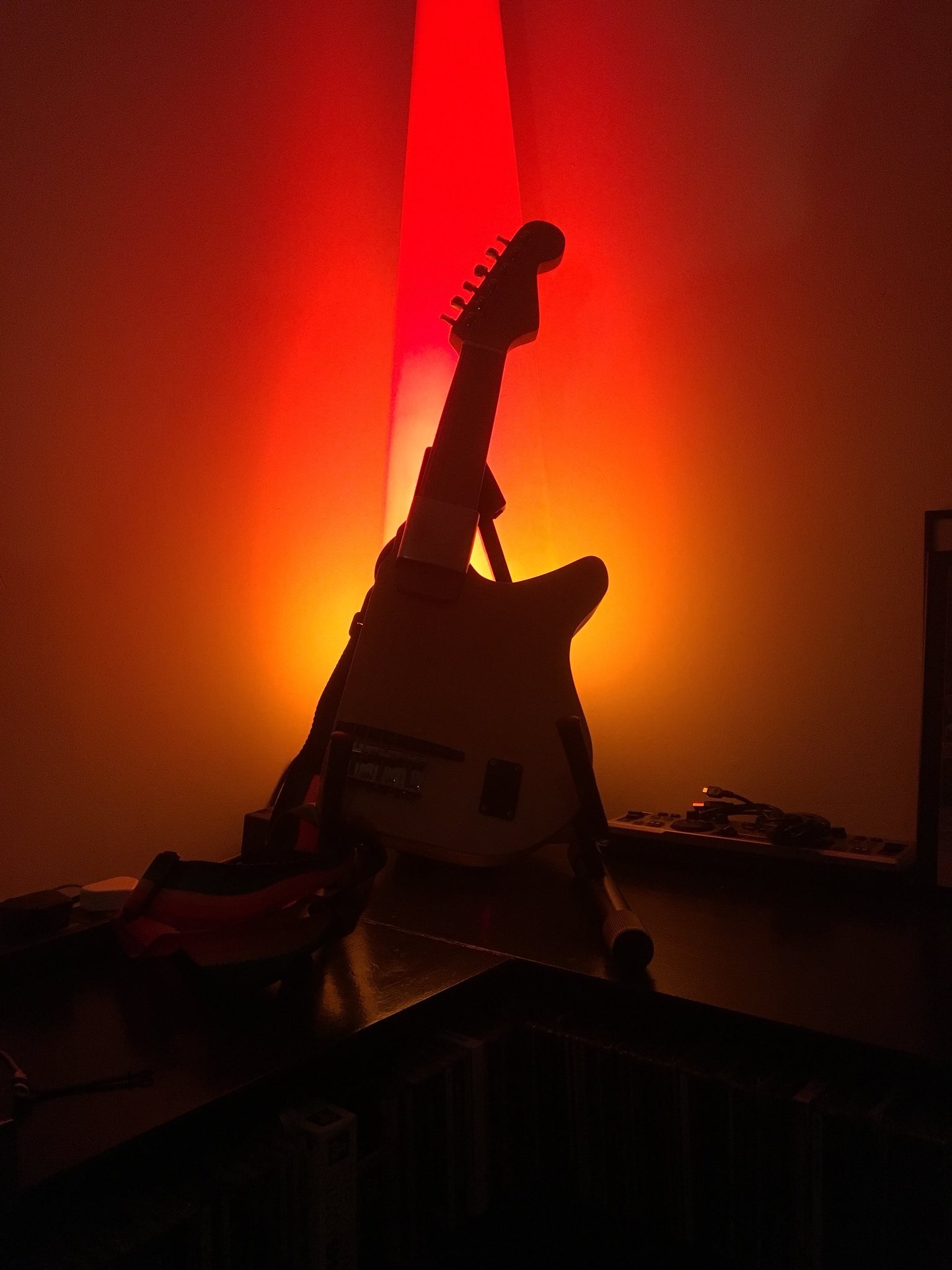 The Kellycaster shadow with orange/red backlight.